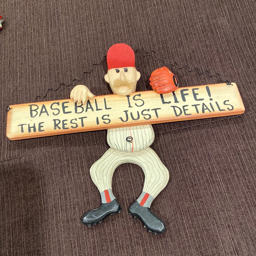 Baseball decor.   Hanging baseball player on sign.  Great for kids room.